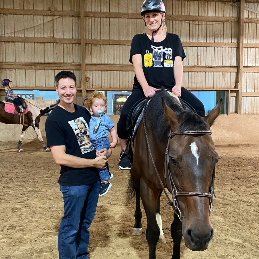 chris taglia with family horseback riding